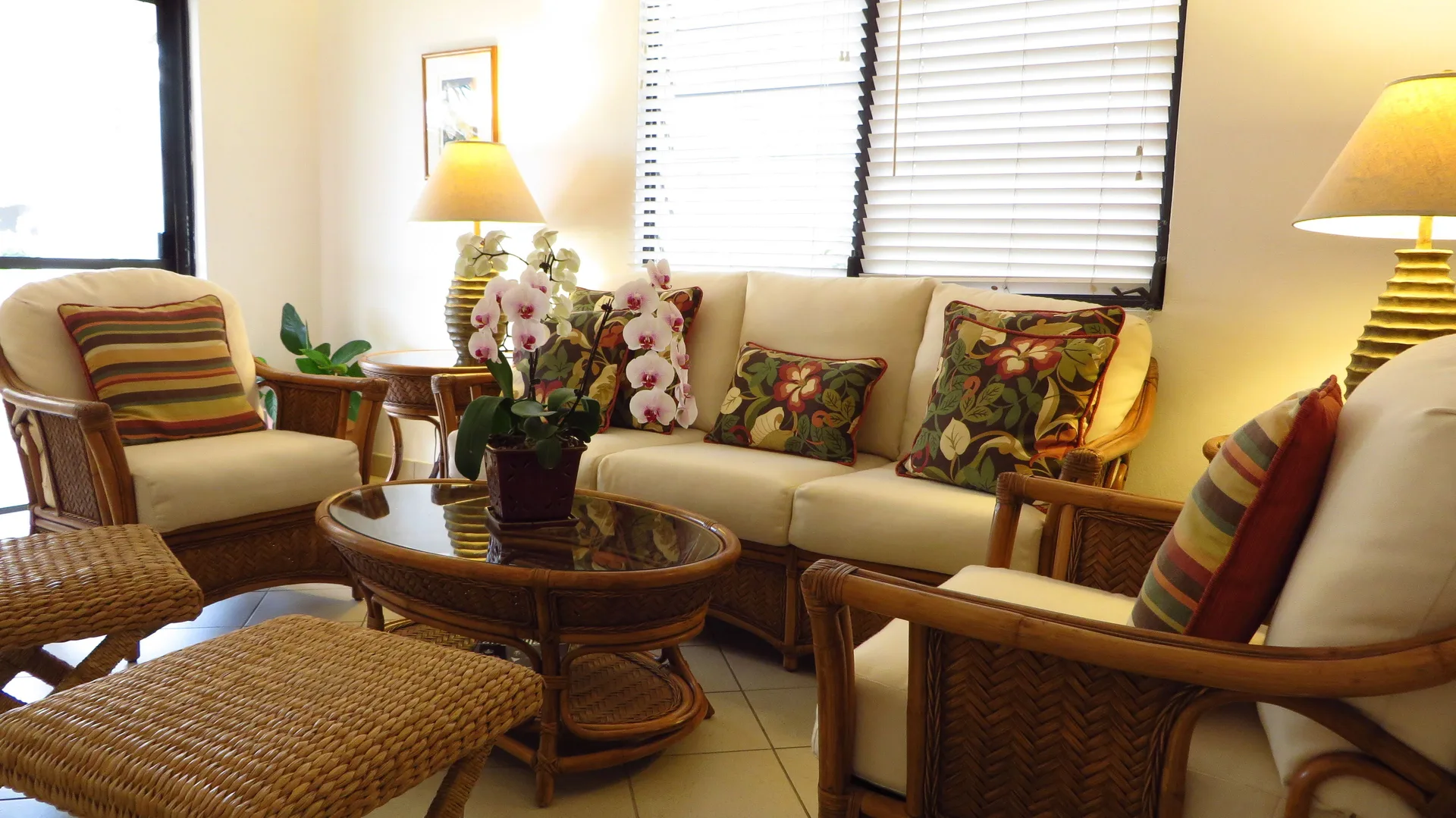 Close view of a wicker living room seating group at Carimar Beach Club.