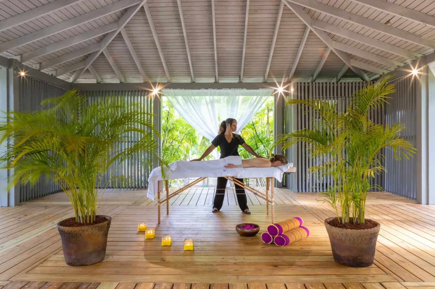 A massage table is set in an open-air spa pavilion at Carlisle Bay.