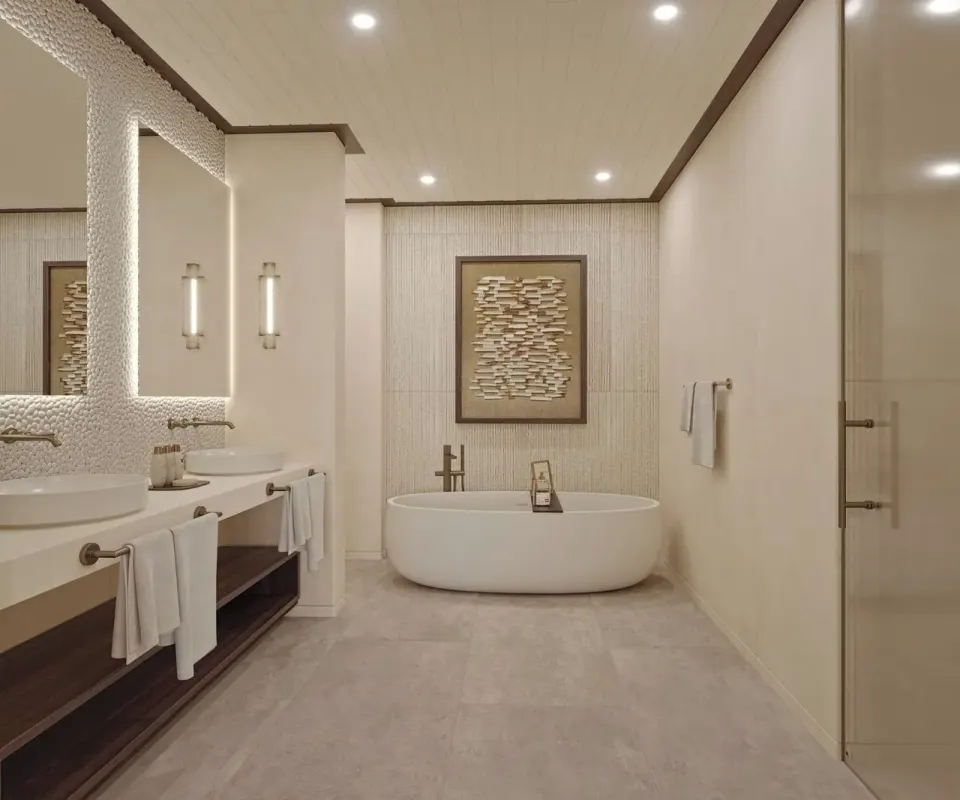 Carlisle Bay bathroom with double vanity and oval tub at Carlisle Bay.