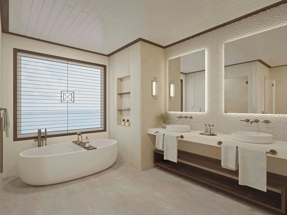 Carlisle Bay bathroom with freestanding tub and double vanity at Carlisle Bay.