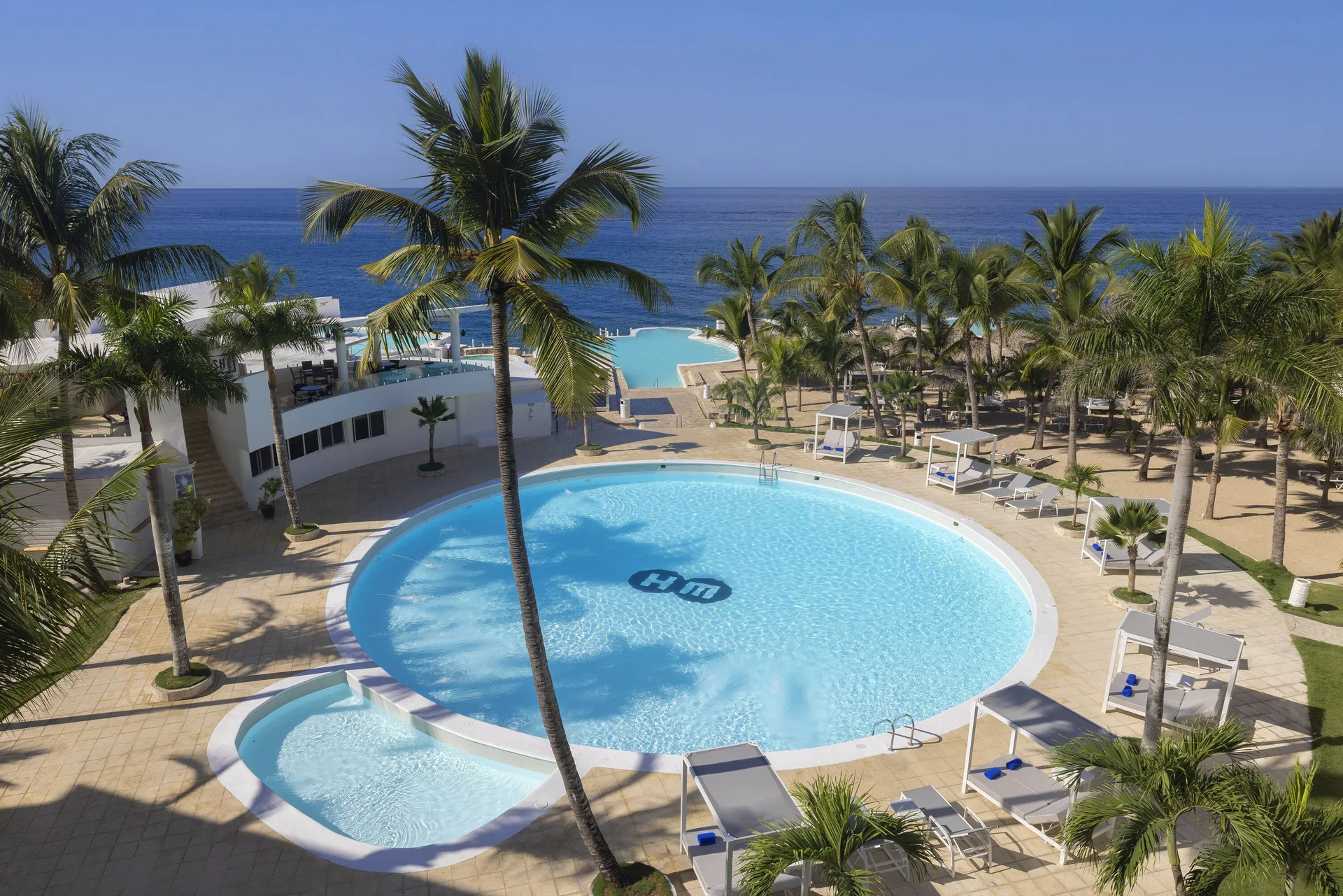 HM Alma de Bayahibe coastal hotel with Caribbean views and relaxed poolside atmosphere