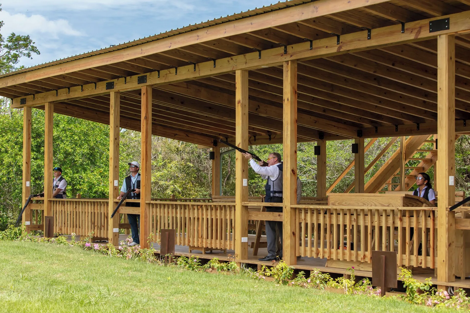 Guests practice shooting at a covered range at Casa de Campo Resort and Villas.