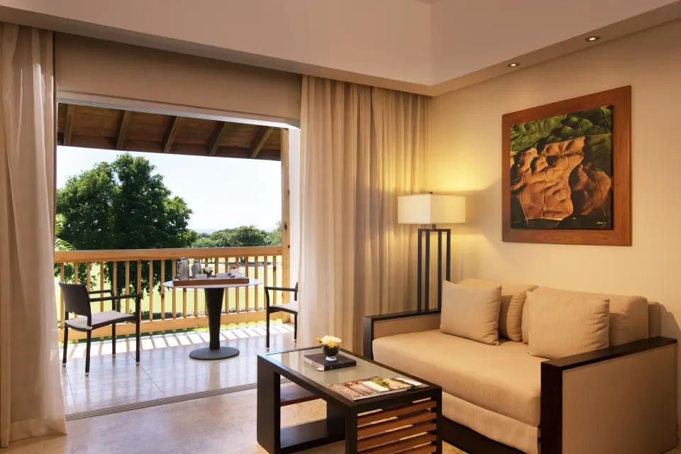 Elite Deluxe sitting area and balcony at Casa de Campo Resort and Villas.