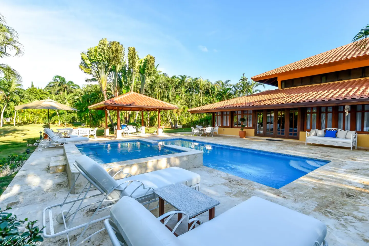 Villa pool and lounge terrace at Casa de Campo Resort and Villas and Villas and Villas.