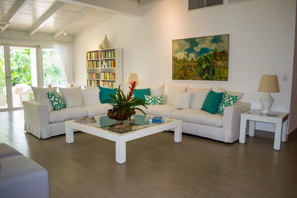 Four Bedroom Classic Villa living room with white sofas at Casa de Campo Resort and Villas.