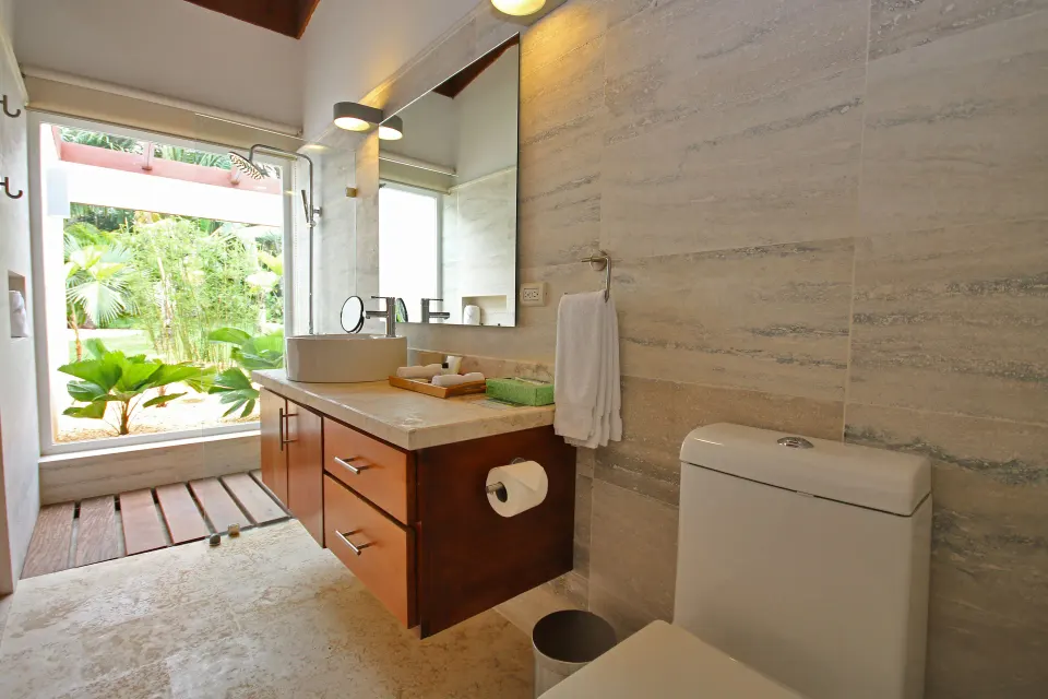 Bathroom vanity and garden window in a Four Bedroom Garden Villa at Casa de Campo Resort and Villas.