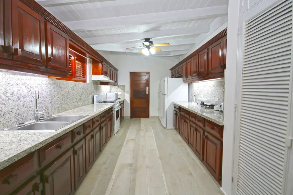 Full kitchen in a Four Bedroom Garden Villa at Casa de Campo Resort and Villas.