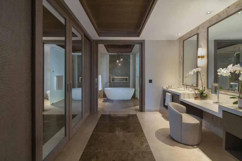 Bathroom vanity and freestanding tub in a Two Bedroom Luxury Premier Suite at Casa de Campo Resort and Villas.