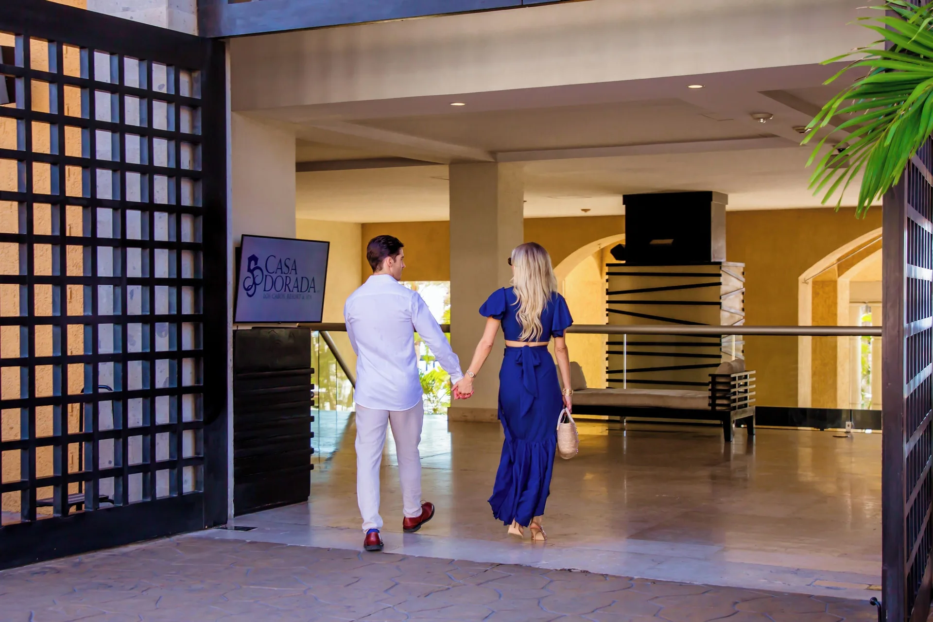 Guests enter the lobby area of Casa Dorada Los Cabos Resort & Spa.