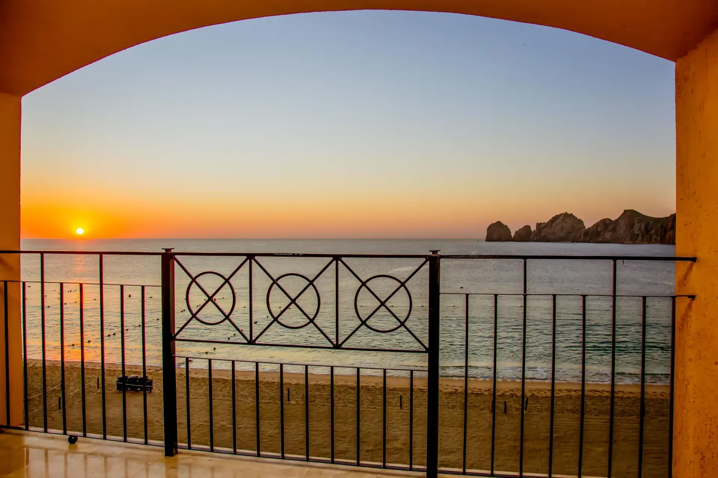 Sunset ocean view from a balcony at Casa Dorada Los Cabos Resort & Spa.