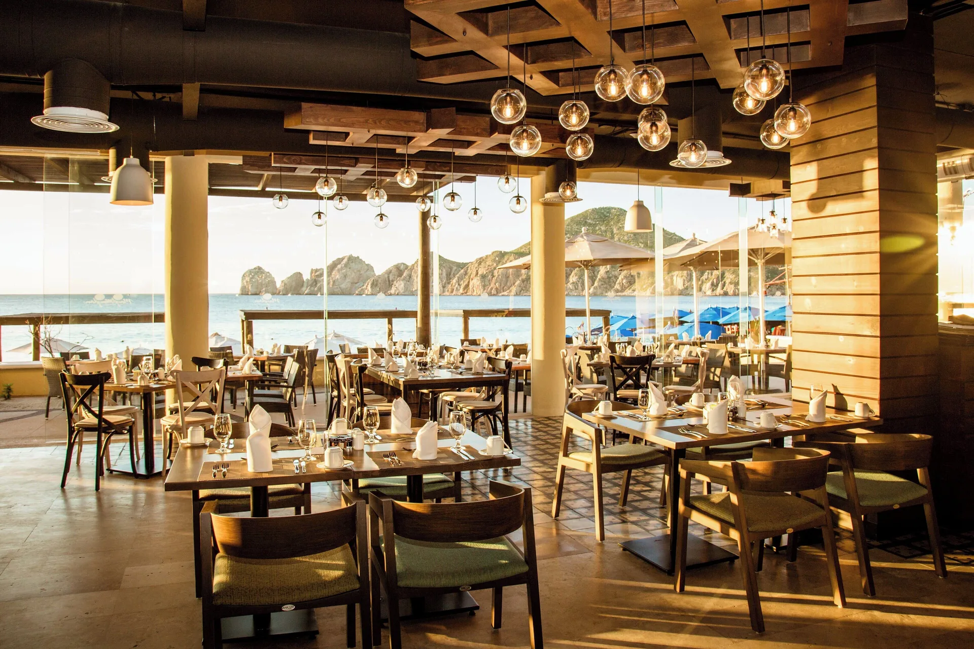 Ocean-view restaurant dining room at Casa Dorada Los Cabos Resort & Spa.