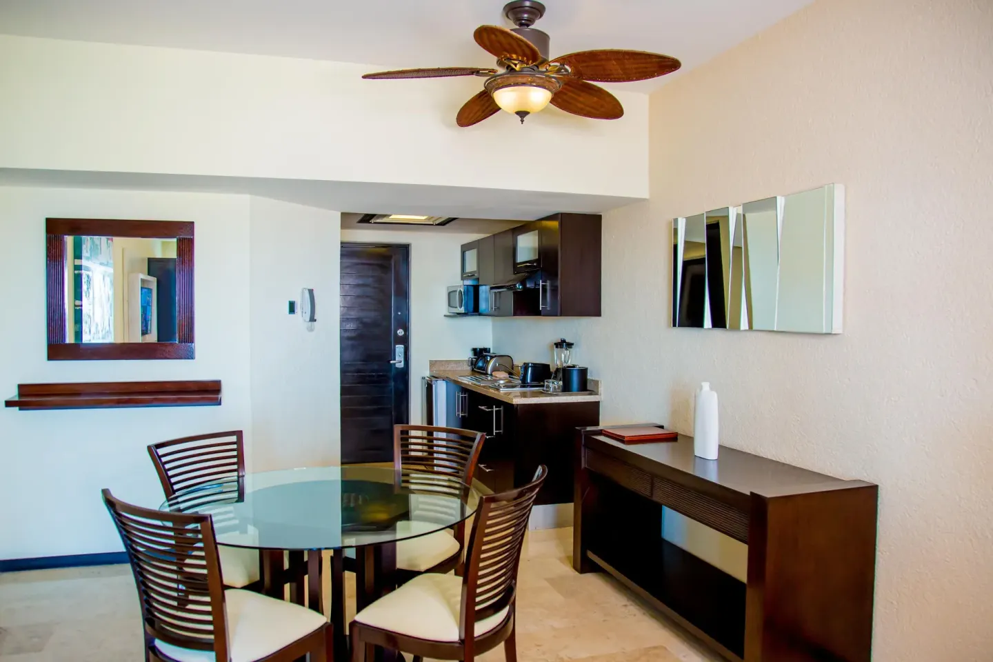 Executive suite dining area and kitchenette at Casa Dorada Los Cabos Resort & Spa.