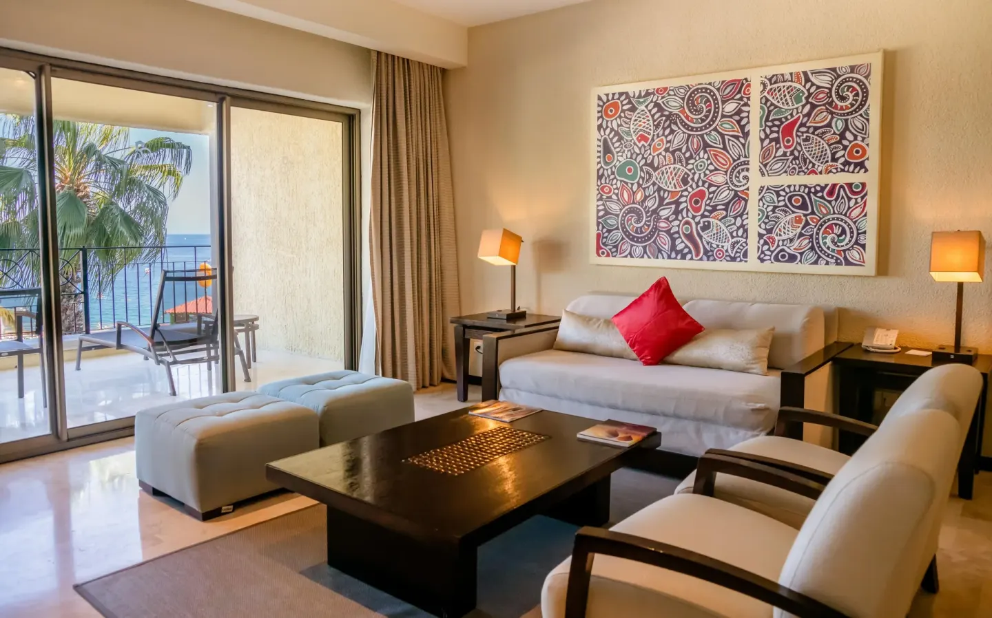 Executive suite living room with balcony and ocean view at Casa Dorada Los Cabos Resort & Spa.