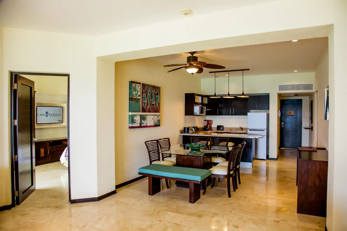 Junior Suite dining area and kitchenette at Casa Dorada Los Cabos Resort & Spa.