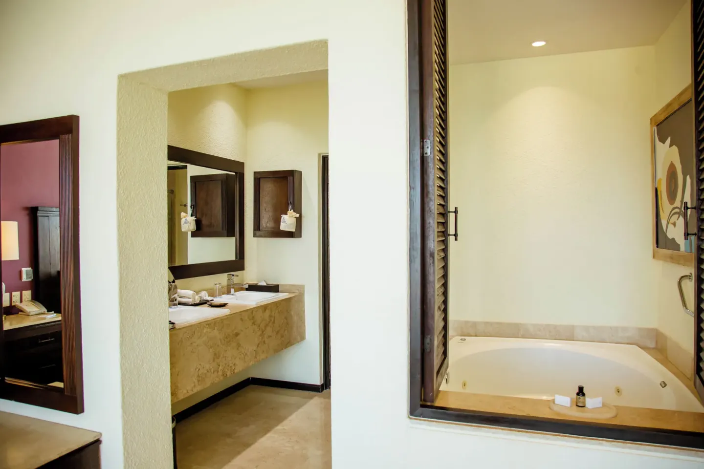 Penthouse bathroom with vanity and soaking tub at Casa Dorada Los Cabos Resort & Spa.