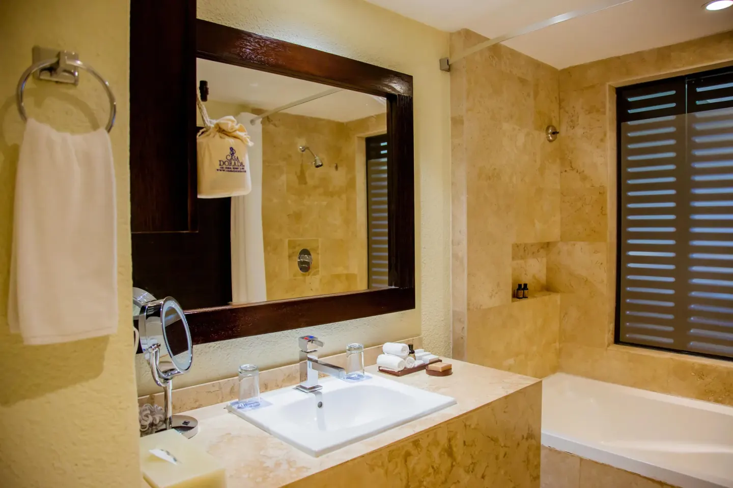 Standard room bathroom with vanity and tub at Casa Dorada Los Cabos Resort & Spa.