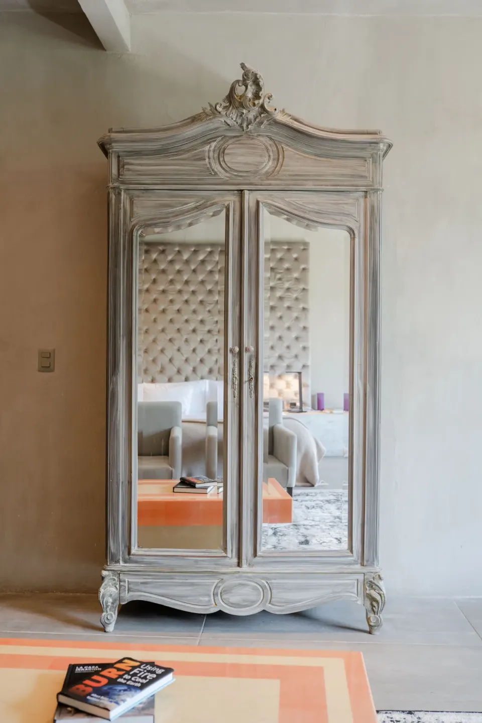 Junior Suite beachfront with king bed, sofa and sliding doors to palm-lined terrace at Casa Malca