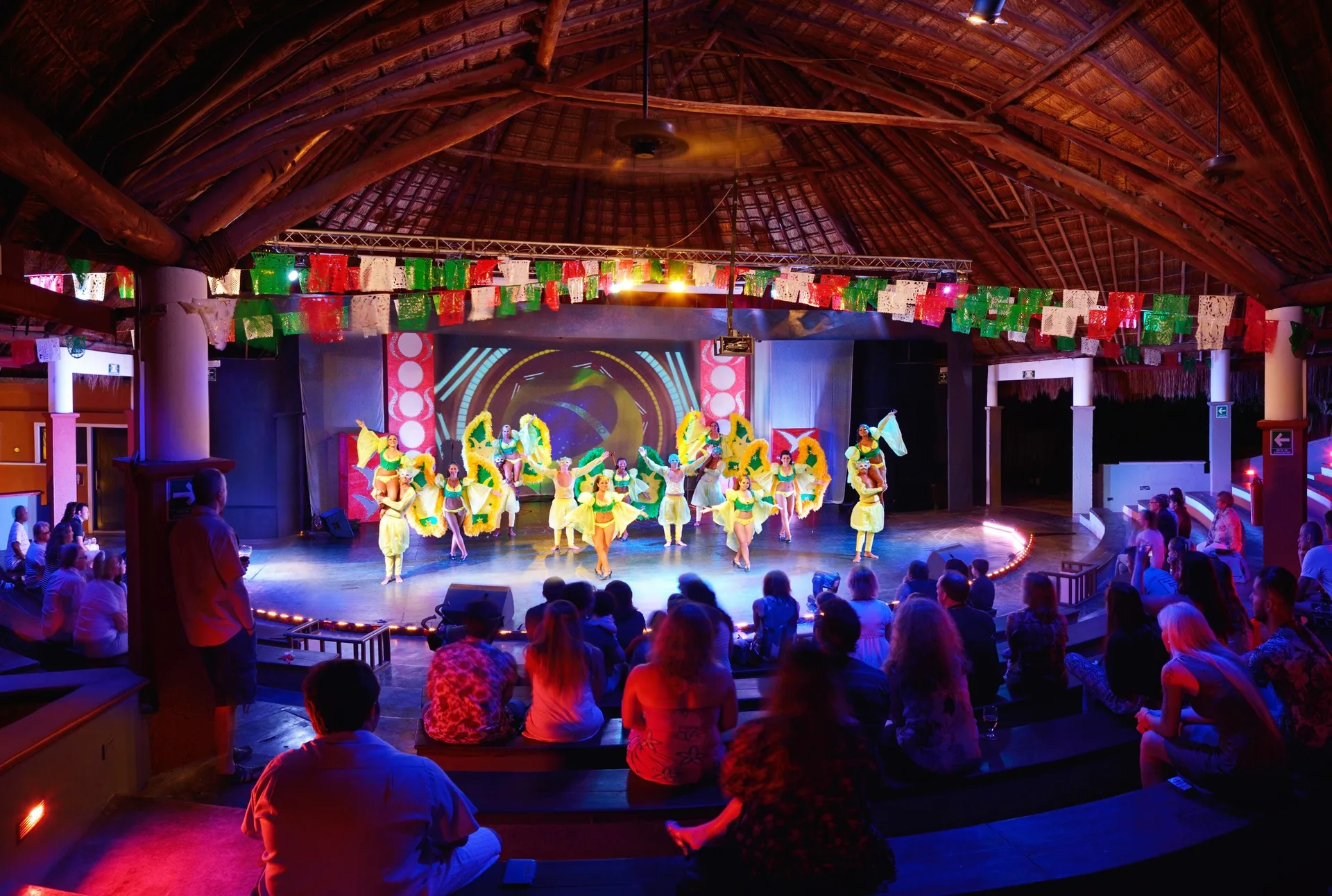 Nightly stage show with dancers and audience seating at Catalonia Playa Maroma.