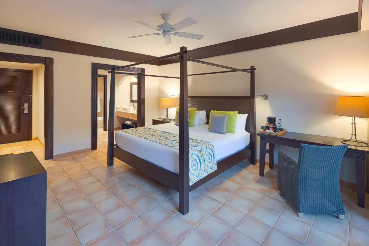 Premium Room with a four-poster king bed at Catalonia Playa Maroma.