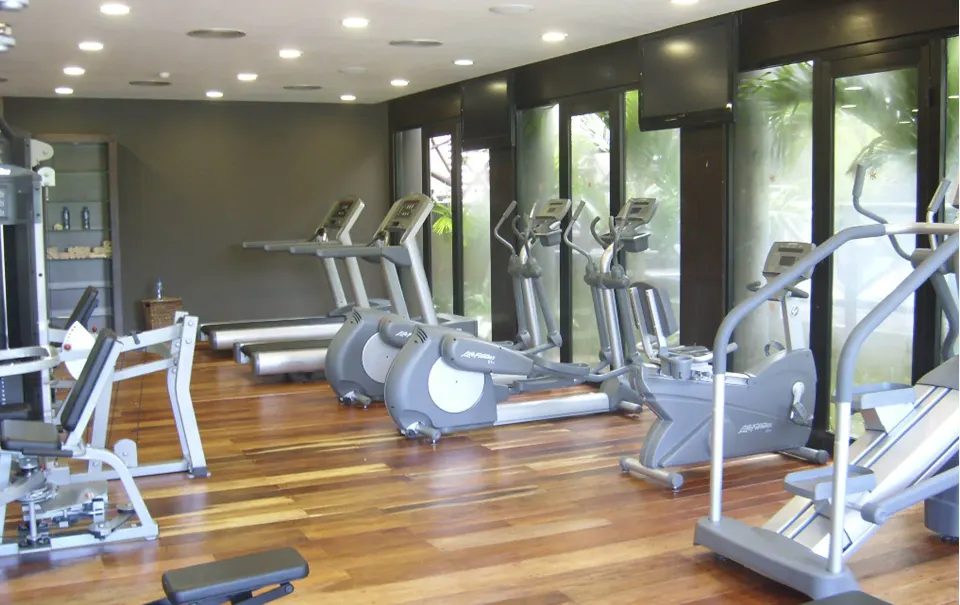 Resort fitness center with treadmills and cardio machines at Catalonia Riviera Maya Resort and Spa