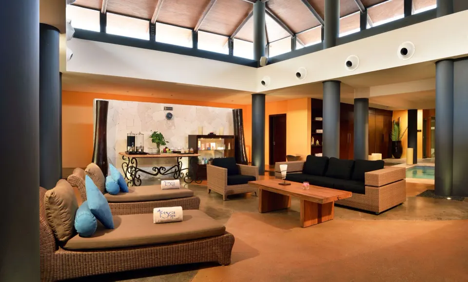 Resort lobby seating area with contemporary furnishings at Catalonia Riviera Maya Resort and Spa