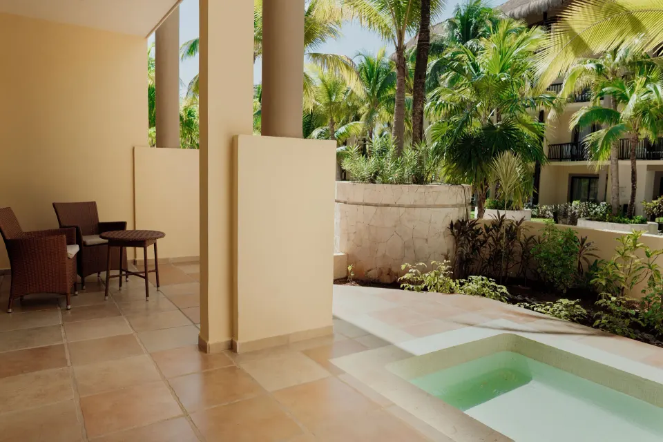 Covered terrace with private plunge pool and seating at Catalonia Riviera Maya Resort and Spa