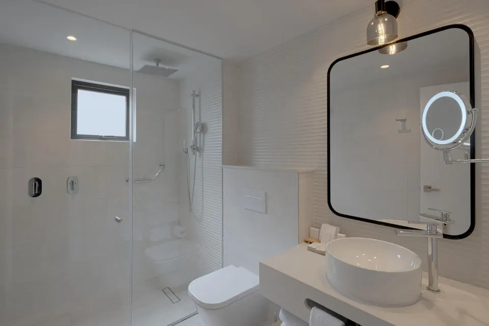 Bathroom in Privileged Premium Deluxe room with walk-in shower at Catalonia Riviera Maya Resort and Spa