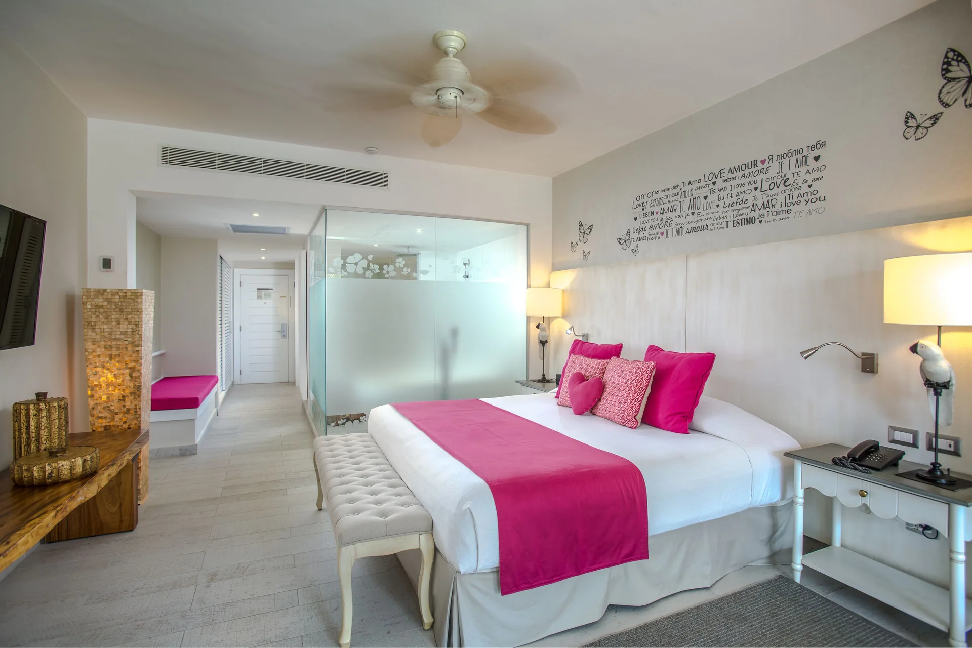 Privileged Romance Deluxe Junior Suite king bed and glass bath at Catalonia Royal Bavaro.