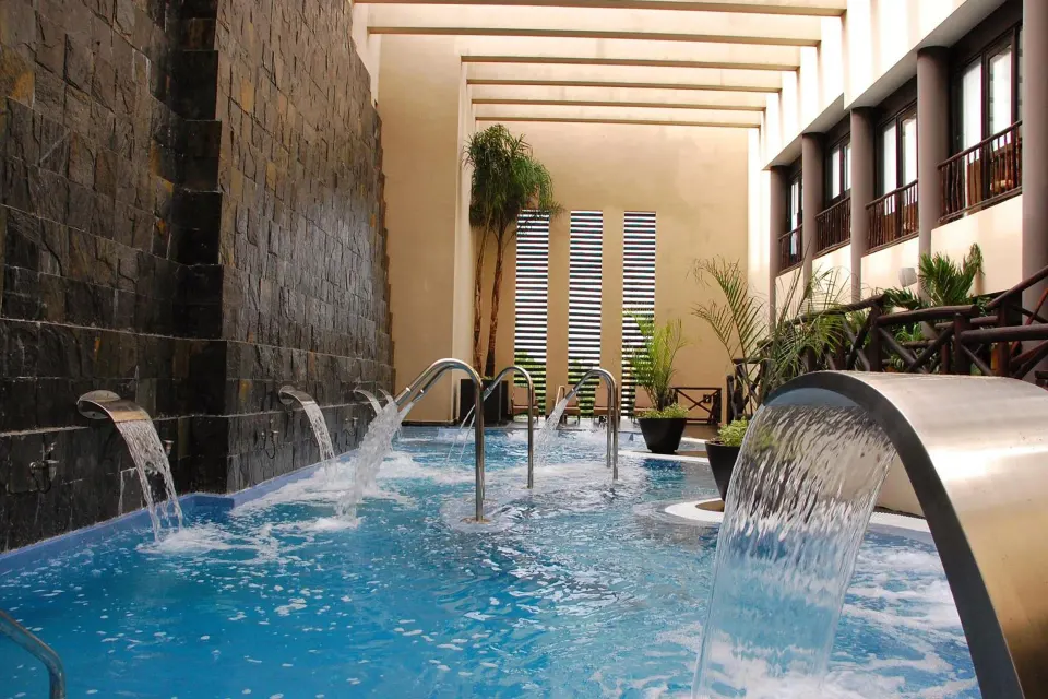 Indoor hydrotherapy pool and water features at Catalonia Yucatan Beach