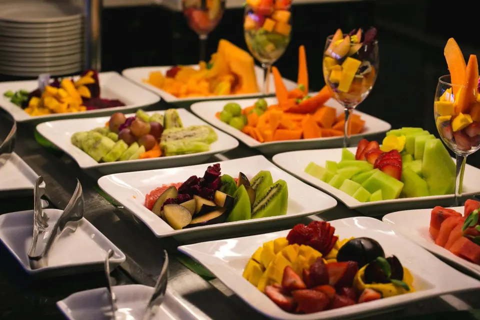 Buffet display of sliced fruit at Catalonia Yucatan Beach