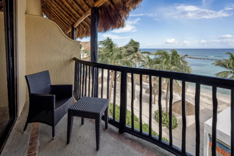Balcony view over beach and ocean from Premium Ocean Front Room at Catalonia Yucatan Beach
