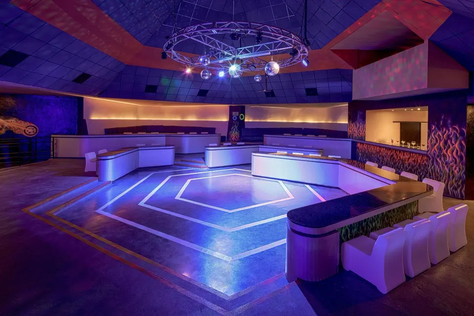 Nightclub dance floor with disco lights at Catalonia Yucatan Beach