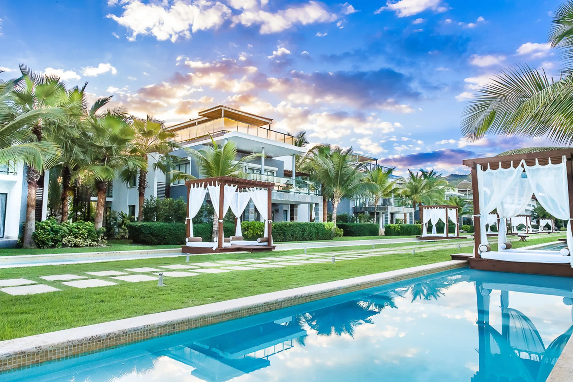 Sublime Samana beachfront boutique resort with modern residences and palm-lined Las Terrenas setting