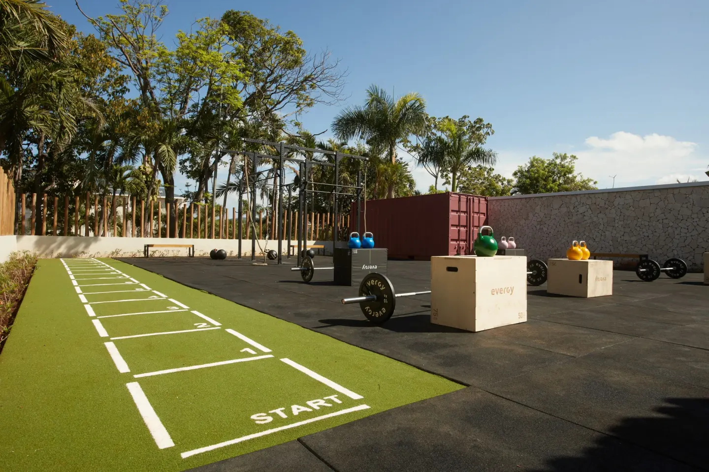 Outdoor fitness turf and weight area at Cayo Levantado Resort.