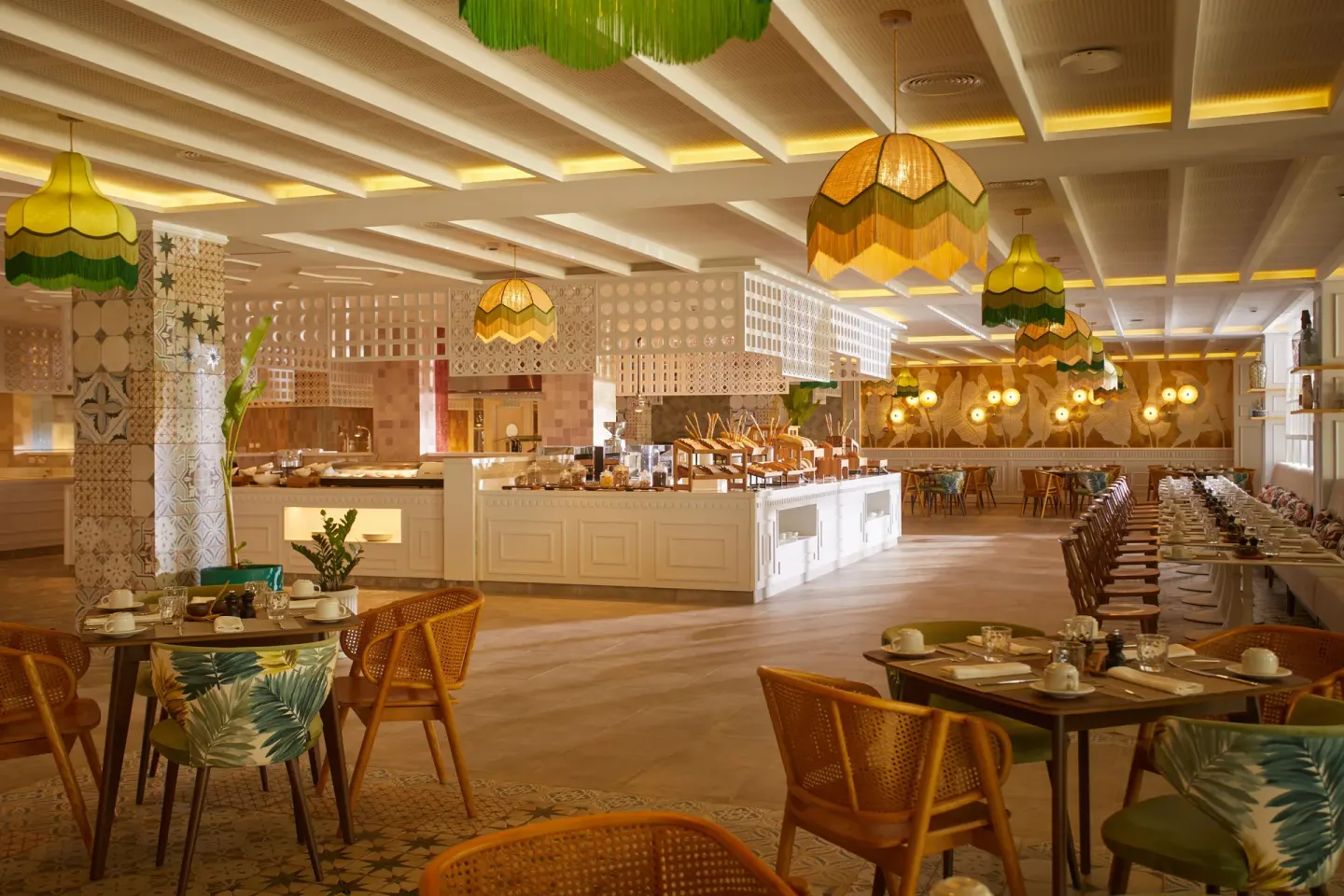 Bright buffet dining room with patterned columns at Cayo Levantado Resort.
