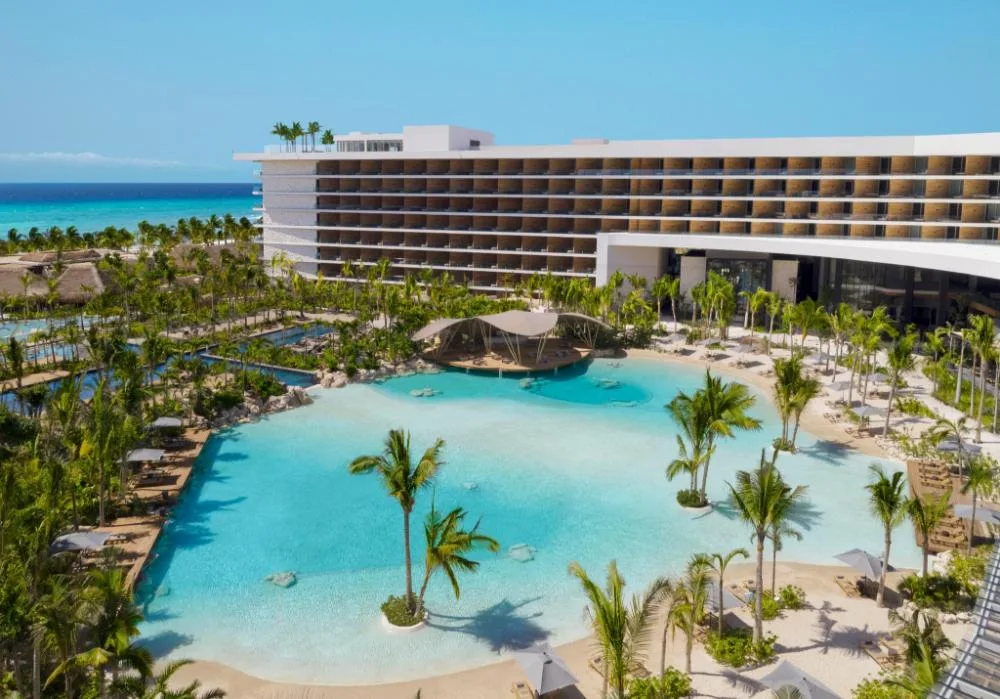 Secrets Moxché Playa del Carmen adults-only luxury all-inclusive resort with lagoon-style pools and contemporary beachfront design in Playa del Carmen, Mexico.