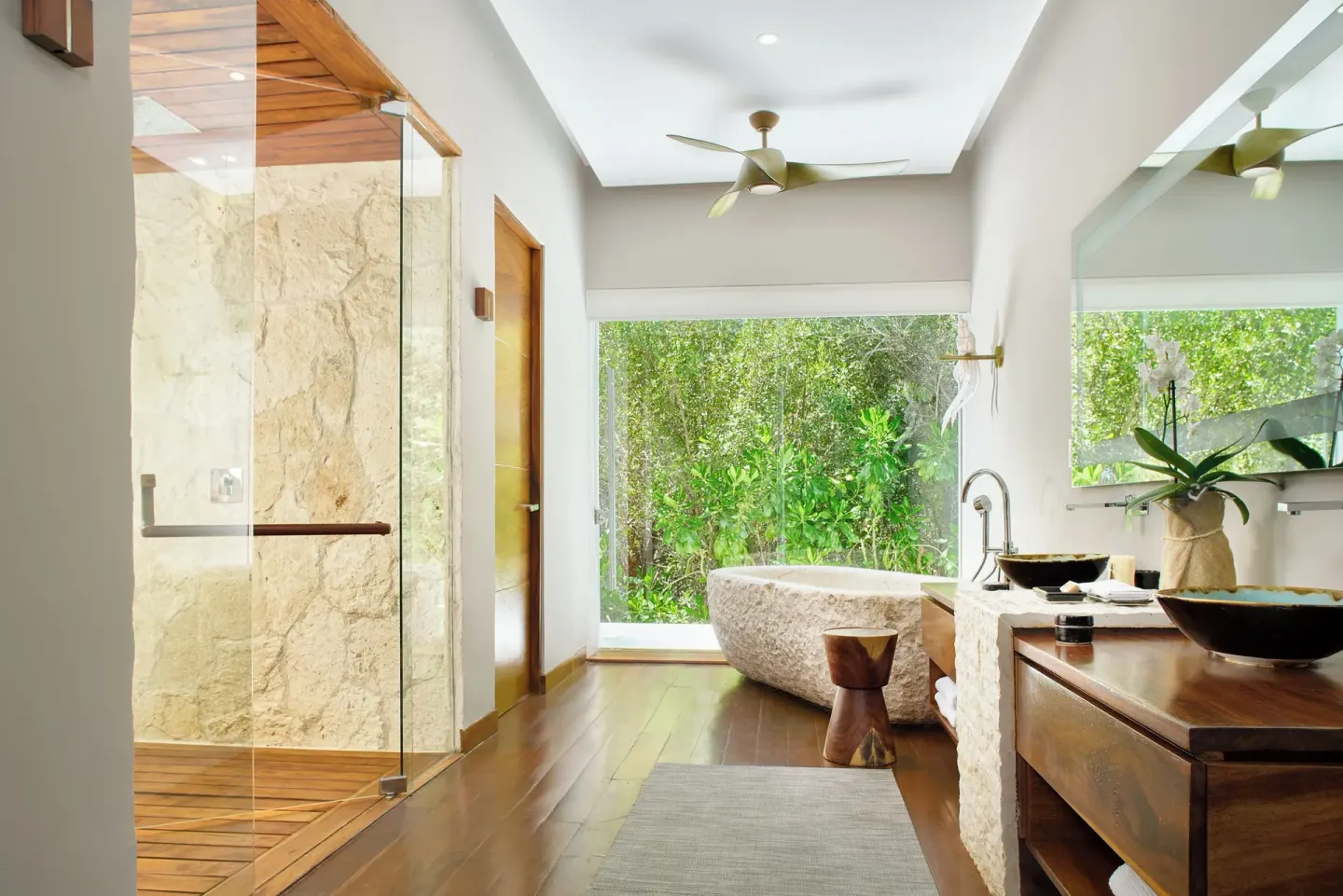 Presidential Villa bathroom with soaking tub and glass shower at Chablé Maroma.