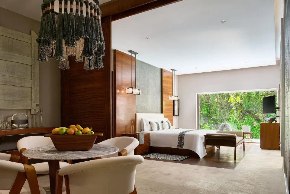 Presidential Villa bedroom and dining nook at Chablé Maroma.