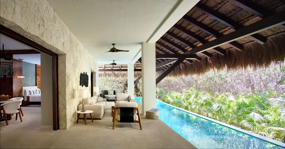 Covered terrace of the Presidential Villa with seating and a narrow private pool at Chablé Maroma.