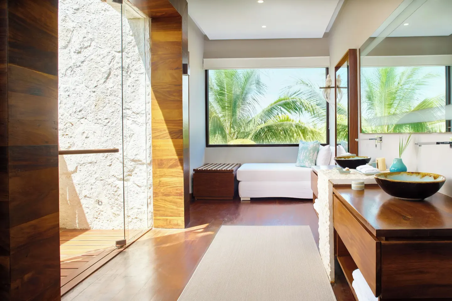 Treetop Pool Villa bathroom with daybed and palm views at Chablé Maroma.