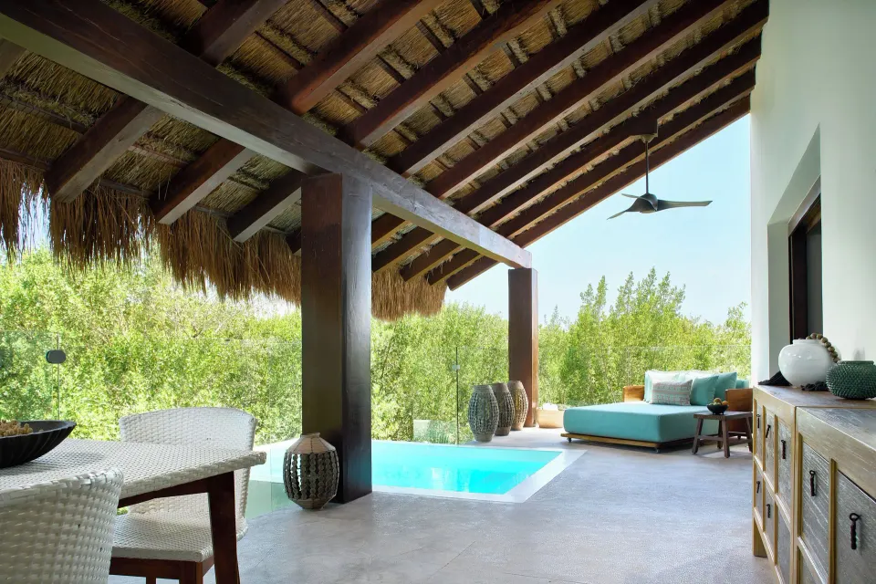 Treetop Pool Villa terrace with plunge pool and daybed at Chablé Maroma.