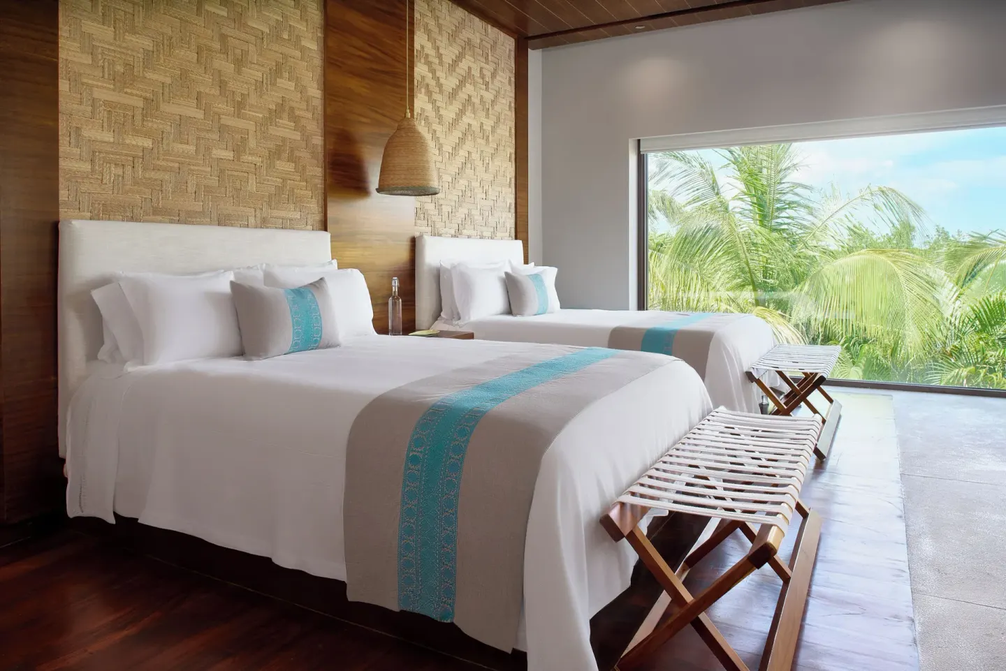 Treetop Pool Villa twin beds with palm views at Chablé Maroma.