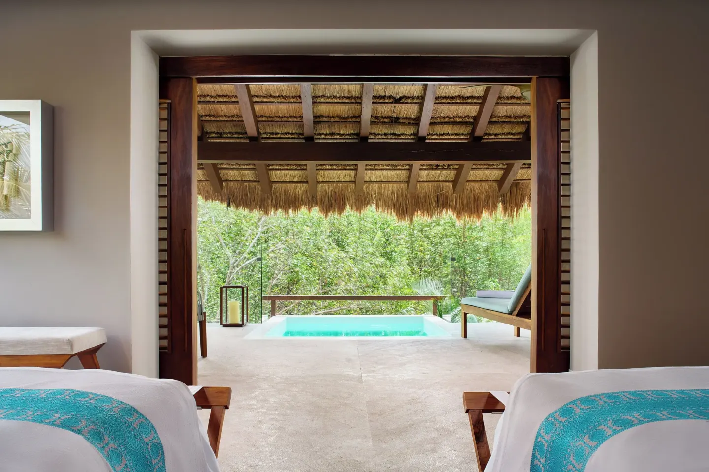 Treetop Pool Villa twin beds facing a private plunge pool at Chablé Maroma.