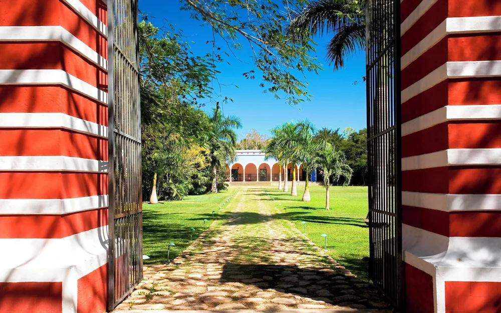 Hacienda Santa Rosa de Lima historic hacienda-style countryside hotel with colonial arches and gardens near Mérida, Mexico.