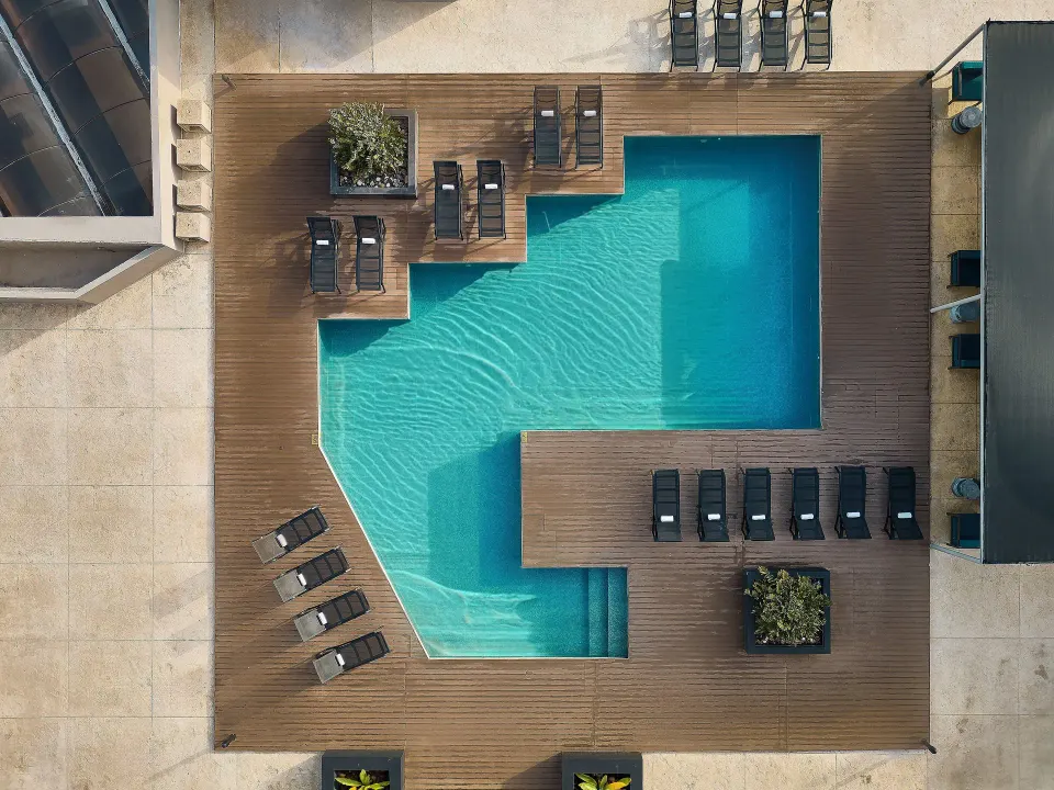 Hyatt Regency Merida Hotel international-brand business and leisure hotel with modern tower exterior in Mérida, Mexico.