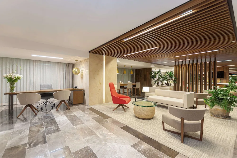 NH Collection Merida Paseo Montejo upscale international-brand hotel with contemporary exterior on Paseo de Montejo in Mérida, Mexico.