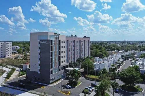 Residence Inn Marriott-affiliated extended-stay hotel with contemporary exterior and suite-style lodging in Mérida, Mexico.