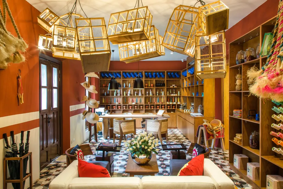 Colorful resort boutique interior with hanging cage lights at Chablé Yucatán