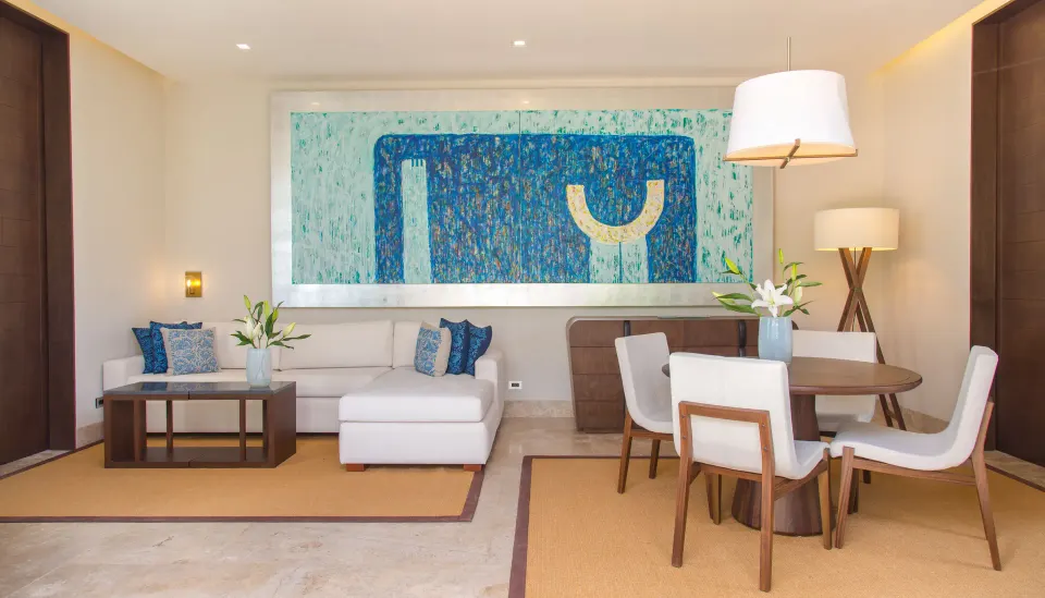 Family Villa living and dining area with contemporary artwork at Chablé Yucatán