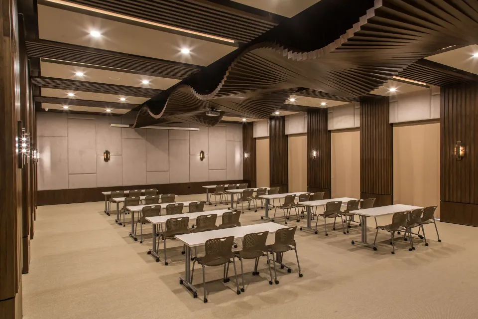 Conference room set with rows of tables and chairs at Chablé Yucatán